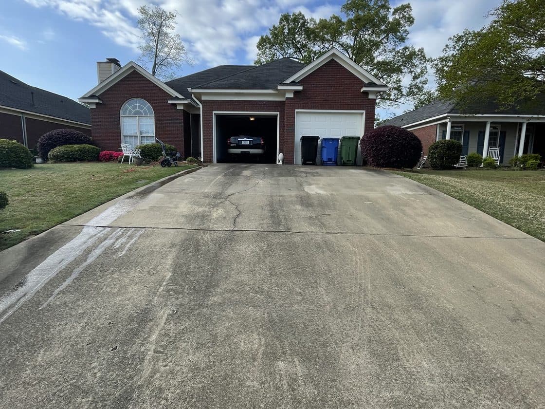 Driveway concrete before cleaning by Team Clean in the Columbus GA area