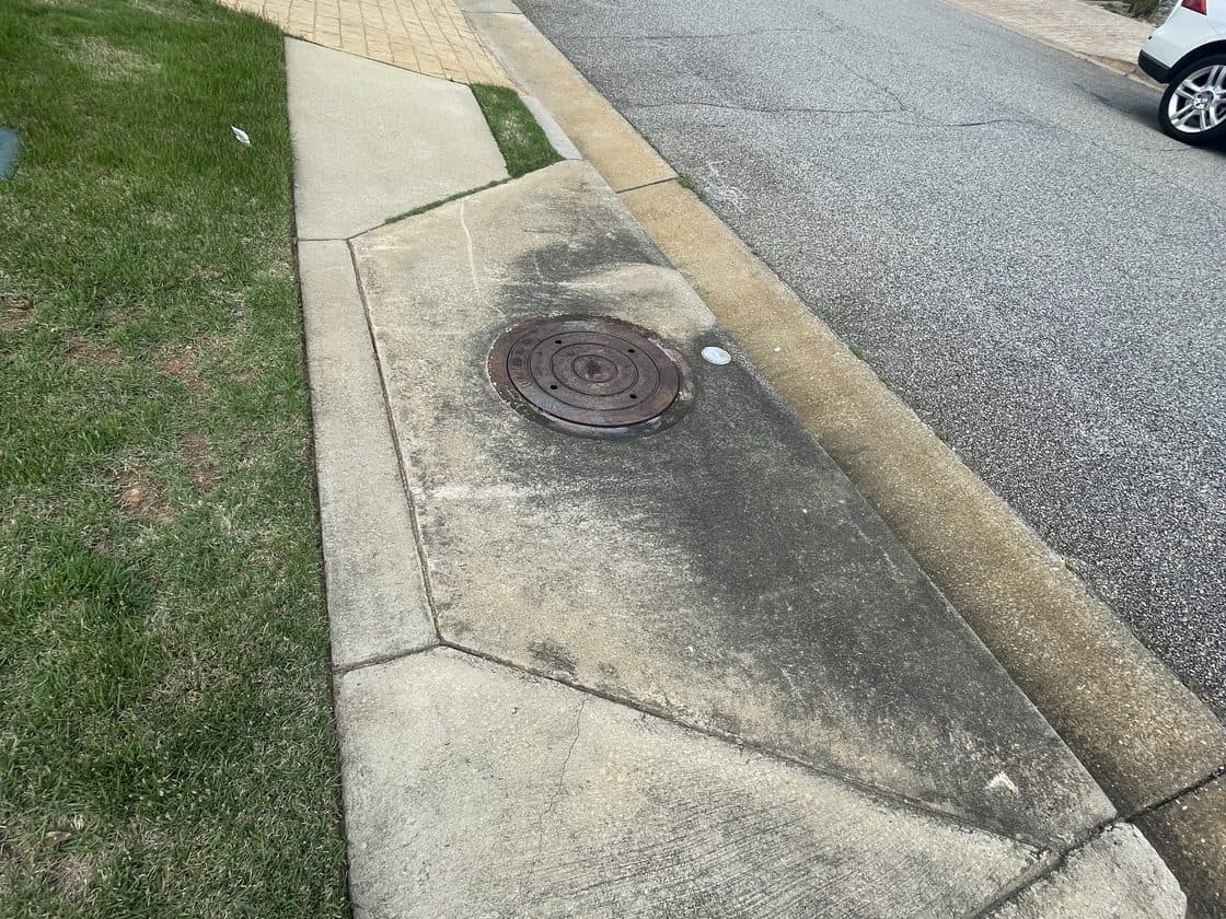 Before driveway cleaning by Team Clean in the Columbus GA area